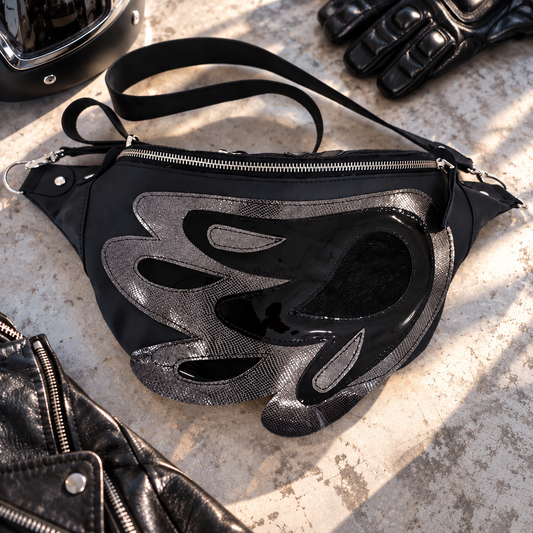 Front view of black and silver Angel Wing leather crossbody bag