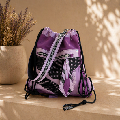 Reverse side of purple leather and suede convertible backpack – MARTINELI