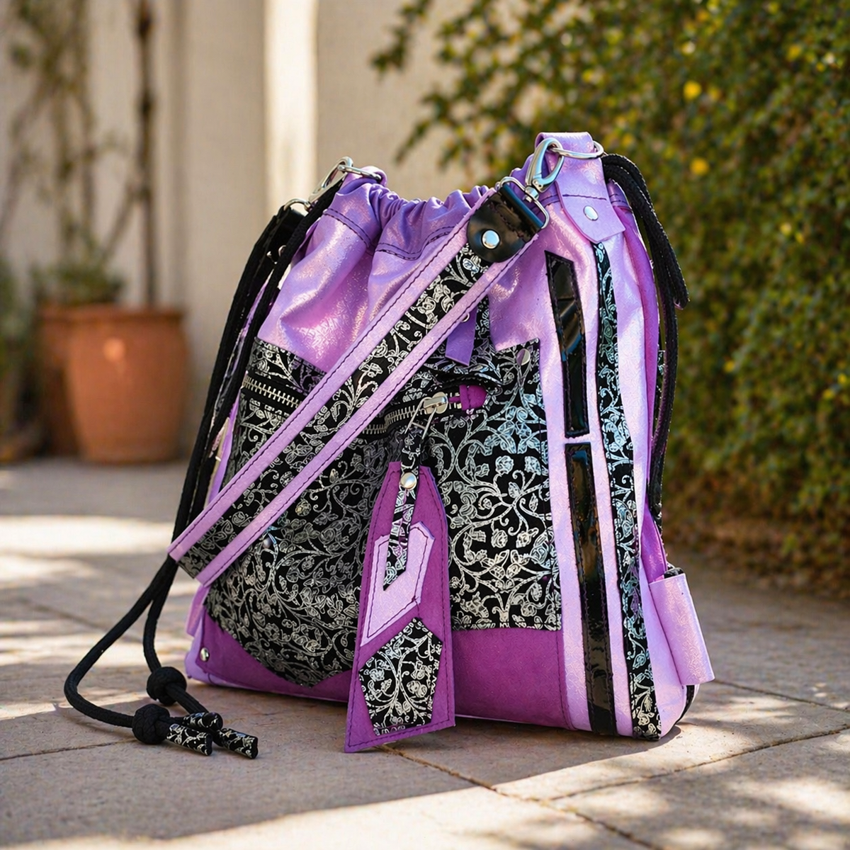 Purple leather and suede convertible backpack with black and silver details – MARTINELI
